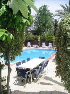 Renos Hotel Apts Polis ภายนอก รูปภาพ